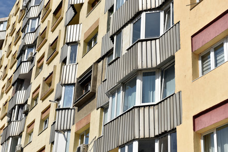 Worn out apartment building from the communist era. Traditional communist housing ensembleの写真素材