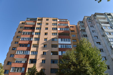 Typical facade of concrete panel building. Post Soviet flat of blocksの写真素材