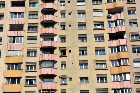 Typical facade of concrete panel building. Post Soviet flat of blocksの写真素材