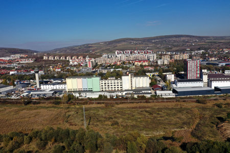 Aerial drone shot of suburban city industrial area buildingsの写真素材