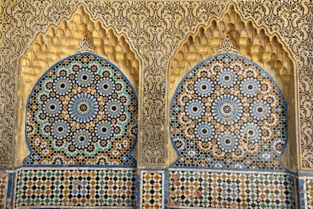 Traditional ornate and colorful arabesque carvings, mosaic tiles, zellige, medina of Tangier, Moroccoの写真素材