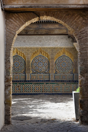 Traditional ornate and colorful arabesque carvings, mosaic tiles, zellige, medina of Tangier, Moroccoの写真素材