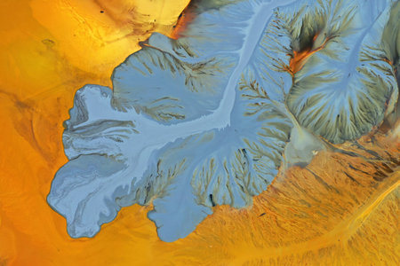 Patterns of acid mine drainage in decanting lake, nature pollution, aerial view by drone
