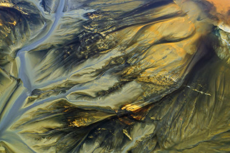 Patterns of acid mine drainage in decanting lake, nature pollution, aerial view by droneの写真素材