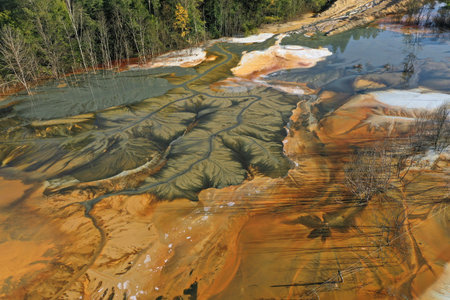 Aerial view of a big waste decanting lake, tailing pond. Mining residual waters discharged from...
