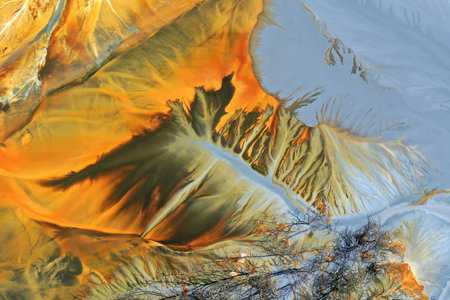 Aerial view of a big waste decanting lake, tailing pond. Mining residual waters discharged from...