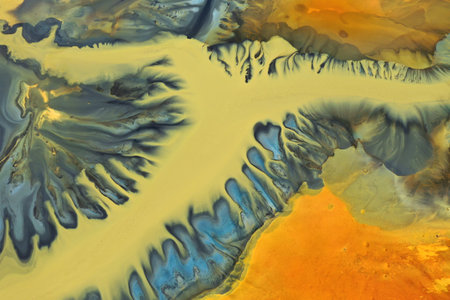 Aerial view of colorful contaminated cyanide residuals waters from gold mine. Abstract nature...