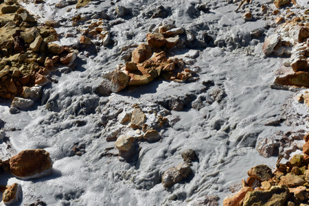 Acidic mine residual water drainage, flowing into decanting pond. Rosia Montana, Romaniaの写真素材