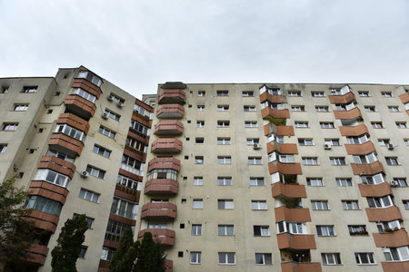 Suburban neighborhood built in communism. Post Soviet concrete flat of blocksの写真素材