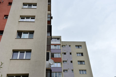 Typical facade of concrete panel building. Post Soviet flat of blocksの写真素材