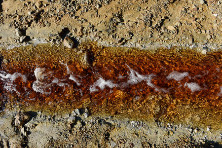 Toxic mine water discharge, acid mine drainage contaminates the environment. Rosia Montana, Romaniaの写真素材