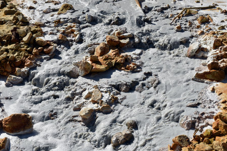 Toxic gold mining residual waters from gold mine flowing and polluting environment. Rosia Montana, Romaniaの写真素材