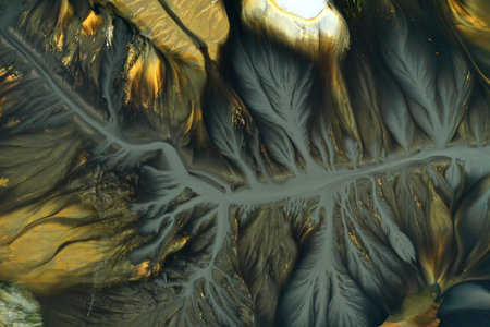 Surreal aerial natural patterns. Residual gold mining leach waters polluting the environment by...
