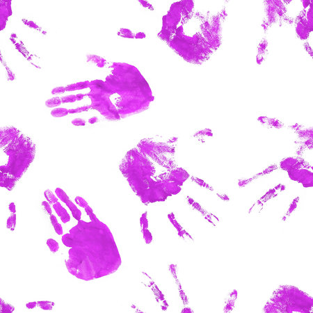 A striking pattern of handprints on a white background, creating a bold and dramatic visual effect.の写真素材