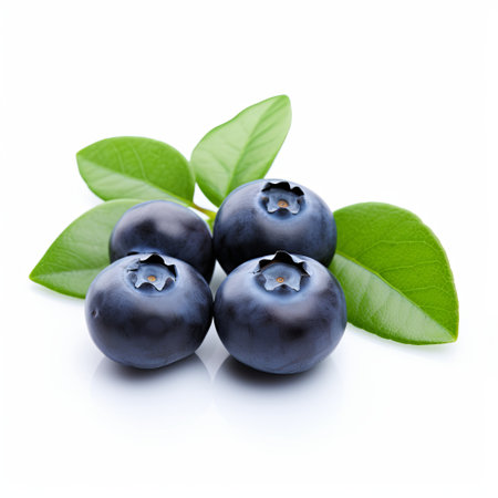 A cluster of fresh blueberries with green leaves on a white background. These nutritious berries are great for healthy eating promotions and recipes, perfect for blogs and wellness concepts.の素材