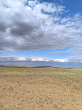 Vast Open Prairie Landscape with Dramatic Sky, Awaiting Discovery and Adventure, Scenic Vista