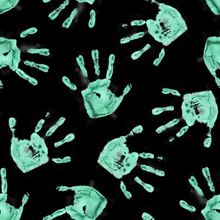 Green Handprints on Black Backgroundの写真素材