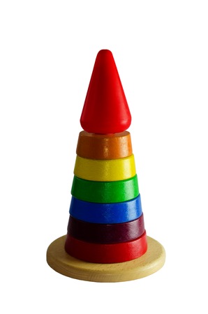 A pyramid of colorful wooden rings. Isolated on white backgroundの写真素材