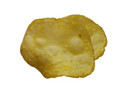 Potato chips on white isolated background close-up