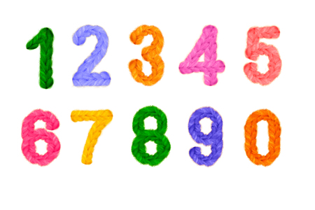 Crochet colored numbers and numbers on New year, holiday, isolated on white background for designの写真素材