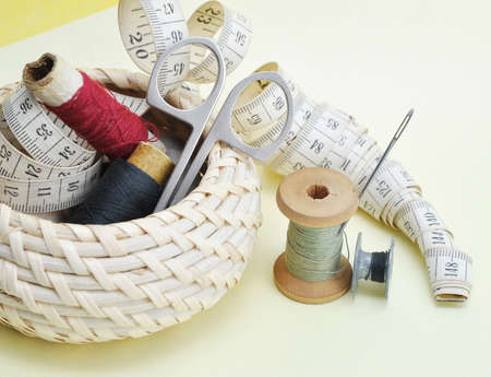 Still-life various accessories of sewing in a basket
