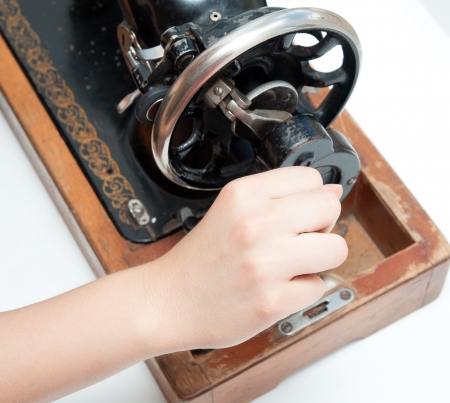 Classic retro style manual sewing machine ready for sewing work の写真素材