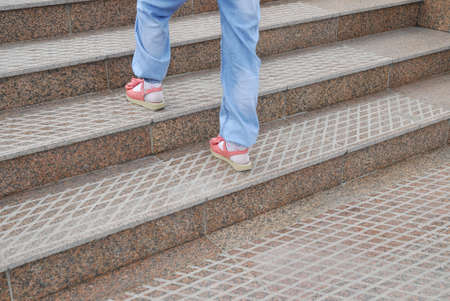 Child climbing stairsの写真素材
