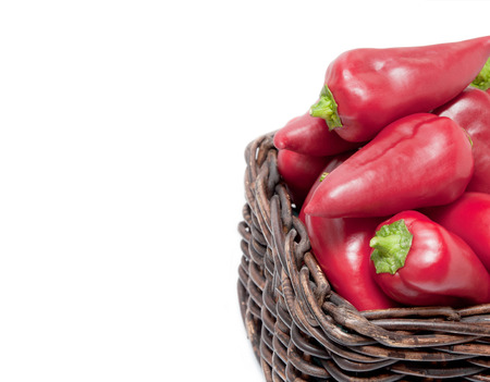 Red bell pepper in a basketの写真素材