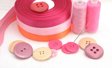 Sewing set on fabric background.の写真素材