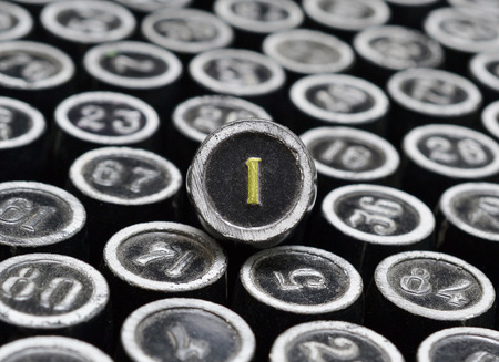 set of  arabic numerals  in old grunge metal, with an emphasis on the figure of oneの写真素材