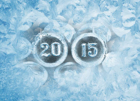 Frozen window patterns. Happy New year 2015. Photo of the numbersの写真素材