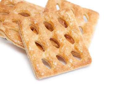 Cookies isolated on white background. Macro with extremely shallow dof. Selective focus limited to center of closest cookie.の写真素材