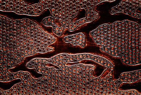 Texture of fabric striped snake leather. Background.