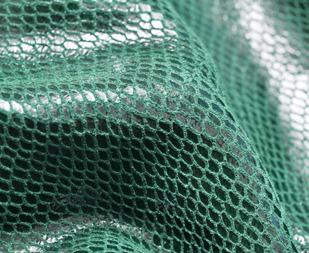 Green Leather. Concept and Idea of Fine Leather Crafting.  Dark green leather laser treatments.