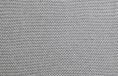 Handmade grey knitting wool texture backgroundの写真素材