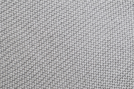 Handmade grey knitting wool texture background