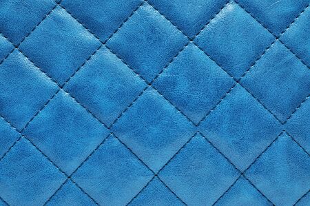 Blue leather texture closeup, useful as background