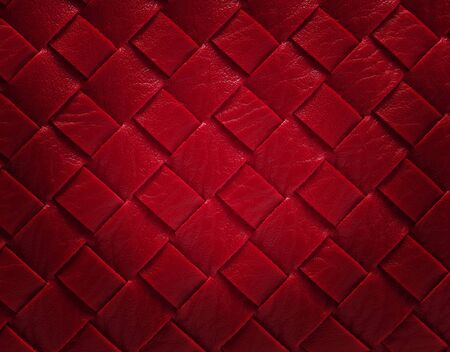 Braided bright red leather texture. Background.
