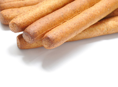 Excellent and natural breadsticks  on the surface. On white background.の写真素材