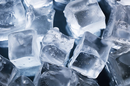 Ice cubes on black background. Shallow depth of field. Toned.の素材
