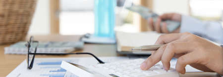 Asian woman is studying online via the internet with a cheerful smile, stay home, New normal,...