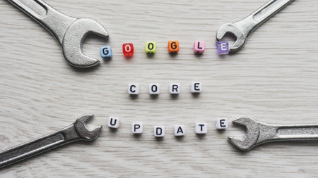 WARSAW, POLAND - JANUARY 27, 2021: Google core update sign made with square beads letters with wrenches. Search engine optimization SEO, Digital Marketing term for Google algorithm update conceptのeditorial素材