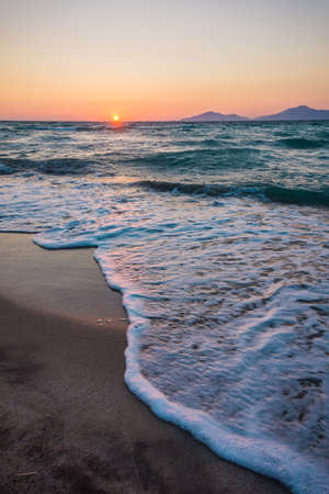 Stunning beach sunset with no people. Marmari, Kos island, Greece. Dodecanese islands, Aegean Sea. Inspirational view, summer vacation conceptの写真素材