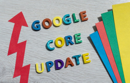 WARSAW, POLAND - JUNE 26, 2021: Google core update text made with colorful letters with a red arrow. Search engine optimization SEO, Digital Marketing term for Google algorithm updateのeditorial素材