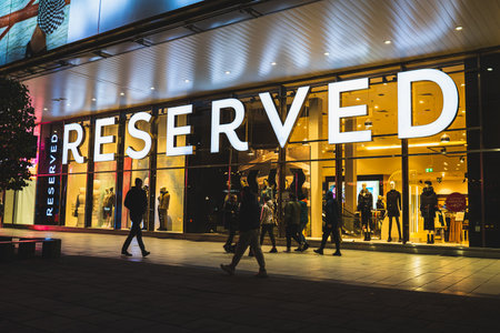 Reserved shop window and entrance sign, Polish clothing store chain in the city center. Warsaw, Poland - October 22, 2021のeditorial素材