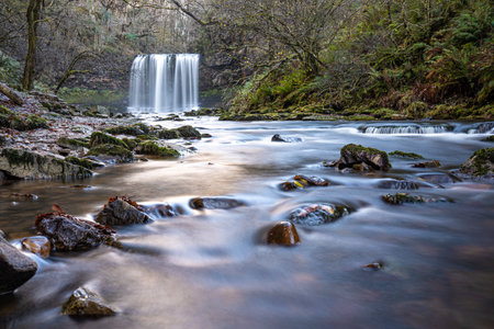 Sgwd yr Eira waterfall or fall of snow along the Four Waterfalls walk, Waterfall Country, Brecon Beacons national park, South Wales, the United Kingdomの写真素材