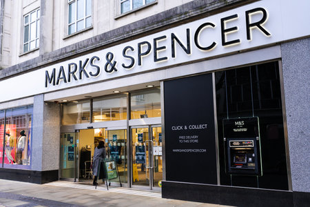 Marks and Spencer shop front with brand logo. Swansea, Wales, UK - January 16, 2022のeditorial素材