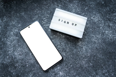 Phone with blank screen and Sign up text.の写真素材