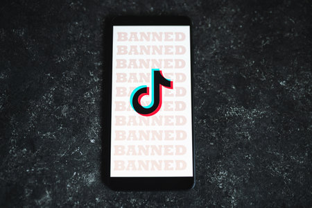 Tiktok logo with Banned signs on phoneのeditorial素材