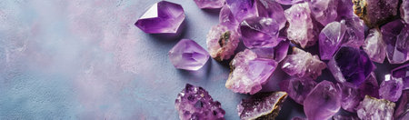 Amethyst crystal banner with concrete background with copy space, many beautiful purple gemstone close-up luxury backdrop. Concepts of spirituality and healing, precious gems and minerals collectionの素材